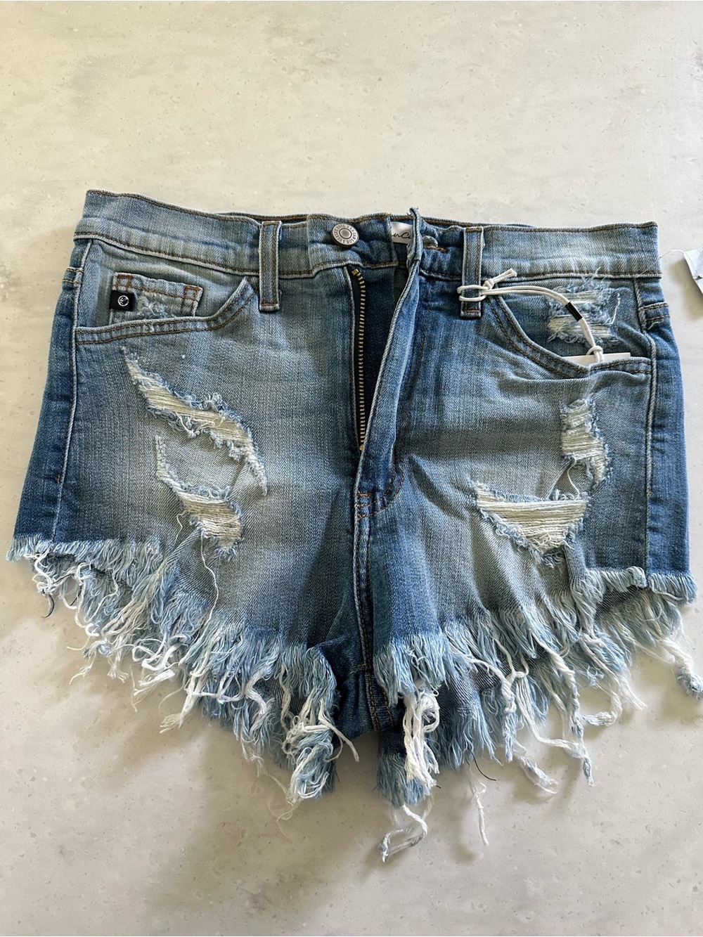 KanCan Women's Light Wash Distressed Frayed Denim Shorts